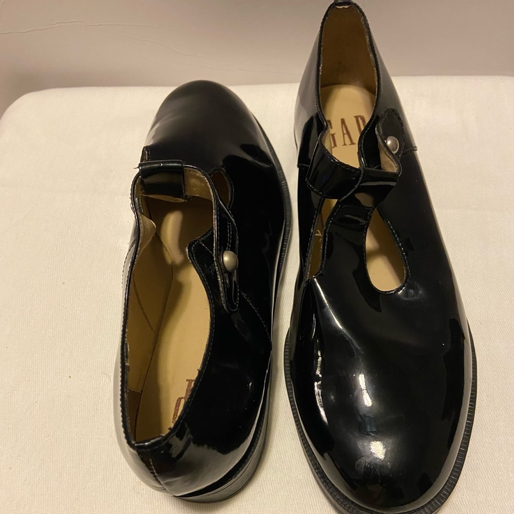 Black patent leather shoe.
